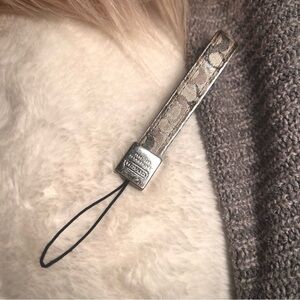 Coach Silver and Sandstone minimalist luxury phone or key chain